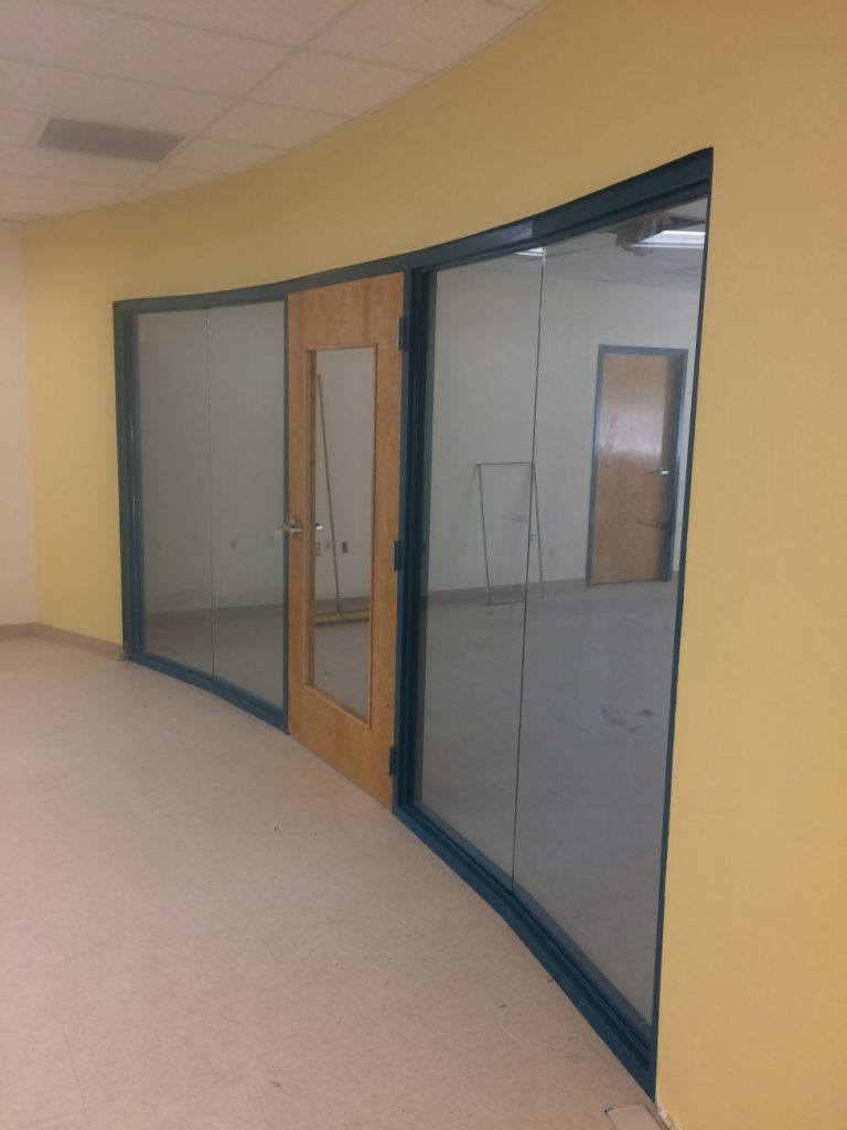 Curved glass panels and door