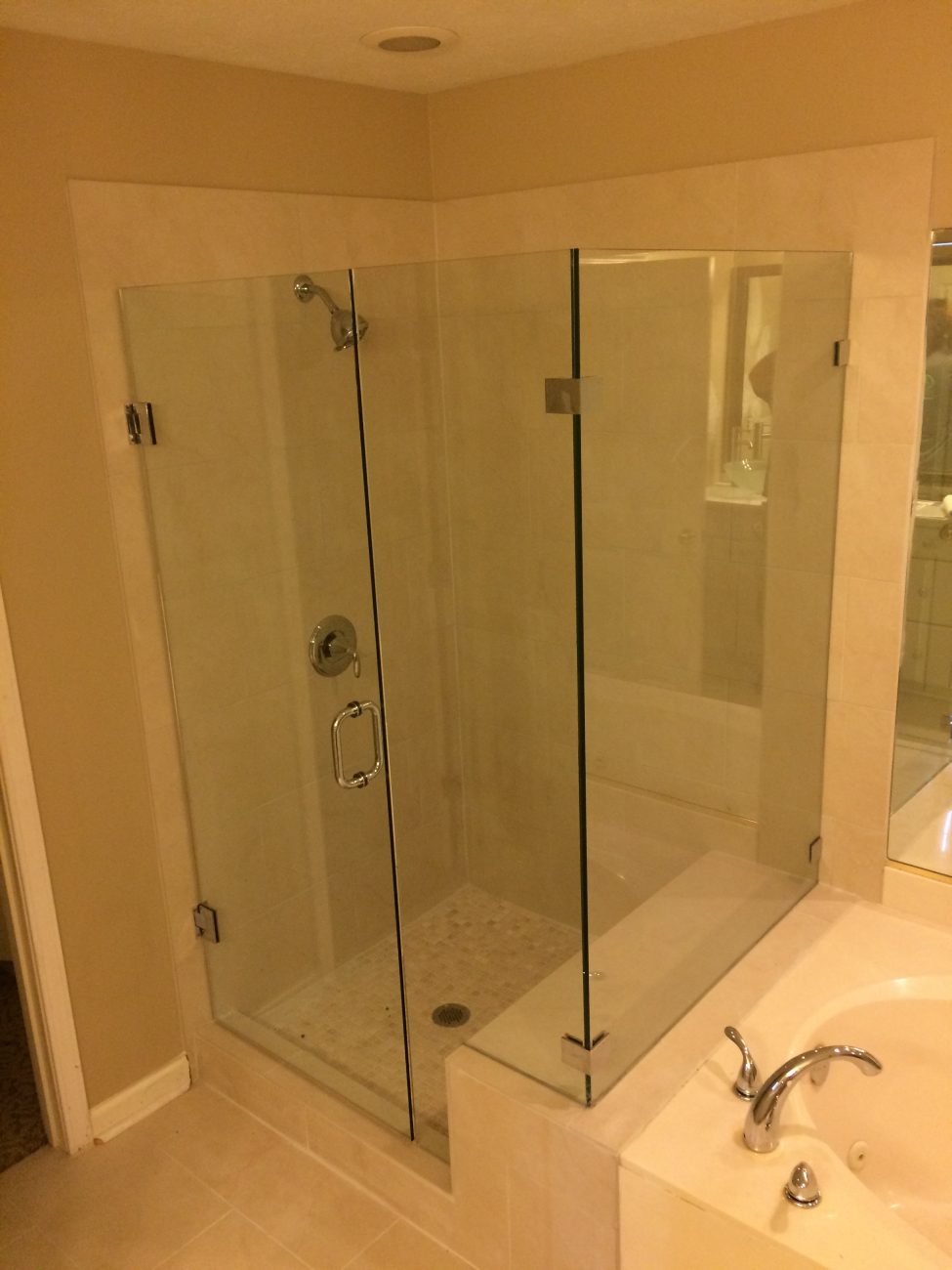 Glass shower in bathroom